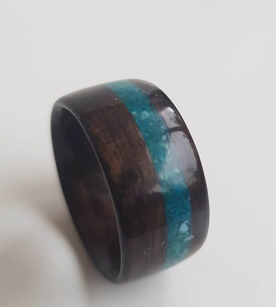 Figured Ebony ring with our tri mix of crushed crystals
